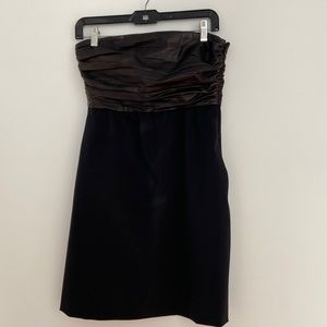 Theory black strapless mini with leather bust and side pockets. Size 6.